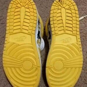 Only Wore Them a Couple Times and Out Grew Them. JORDAN 1 RETRO, FLORAL W/Y